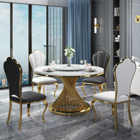 Ensemble de table à manger ronde de luxe moderne Meubles de maison élégants avec marbre artificiel en acier inoxydable pour le salon et l'hôtel