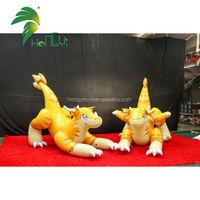 Jouet gonflable personnalisé en forme de dragon de l'usine Hongyi, chien de dessin animé en PVC avec sphère