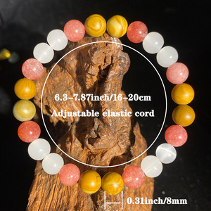 La pulsera DAISY xiaod está hecha de piedra natural de <span class=keywords><strong>calcedonia</strong></span> con vetas de madera, <span class=keywords><strong>que</strong></span> <span class=keywords><strong>es</strong></span> un accesorio de cristal <span class=keywords><strong>que</strong></span> atrae la atención. - Product Image 3