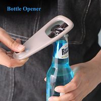 5-delige ruimtebesparende handmatige keukenhulpjesset: knoflook-/gembermolen, kaasschaaf, groente-/fruit schiller, pizzames, flesopener