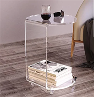 Table basse en acrylique transparente de luxe moderne sur mesure pour salon, avec roulettes, en carton, pour grossistes