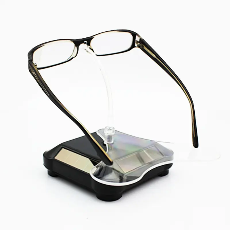 Directement fourni par le fabricant avec cadre de lunettes à énergie solaire table d'affichage rotative lunettes table d'affichage photographie