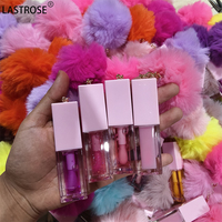 Huile à lèvres brillant nourrissant avec pompon hydratant en gros végétarien dodu huile à lèvres changement de couleur beauté peut imprimer Logo