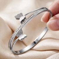 Bracelet en acier inoxydable, nouveau style européen et américain, design papillon, rangée unique de strass, minimaliste et élégant