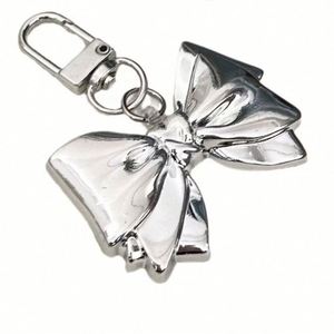 Korean Ins Creative Heart Keychain New Bow Tie <b>Acrylic</b> Decorative Pendant Rechargeable Metal Keychain - Product Image 3