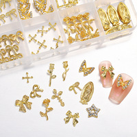 Charmes pour ongles luxueux en plastique 3D avec strass, boîte de 12 compartiments, charmes à la mode très vendus, nœud papillon, croix, statue de Bouddha pour les ongles
