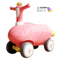 Coche de juguete deslizante para niños al por mayor, modelo Carrot, con dirección segura de 45 grados, carrocería completamente redondeada, luces LED, música y peso ligero.
