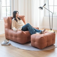 Fauteuil de salon moderne en cuir, rembourré de particules, design unique, doux et simple, style pouf, canapé relax inclinable, Divano