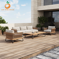 Ensemble de canapés d'extérieur modernes en aluminium, mobilier de patio de luxe résistant à l'eau et toutes les intempéries, canapé de jardin durable en teck et corde pour villa et cour.