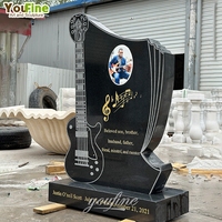 Tombeau de pierre tombale de guitare en marbre noir de cimetière simple