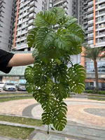 Vigne artificielle suspendue avec des feuilles en plastique fausse plante traînante pour la décoration murale de mariage de balcon intérieur extérieur
