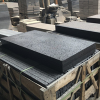 Carreaux de revêtement de mur intérieur extérieur en pierre de travertin noir de luxe naturel pour la décoration d'hôtel