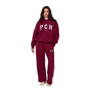 Nouvel ensemble de survêtement 2026 en 100 % coton pour femme, deux pièces : pantalon large et sweat à capuche, idéal pour l'échauffement (vente en gros) - Product Image 1