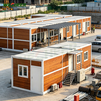 Construction rapide de maisons préfabriquées mobiles modernes et luxueuses en conteneurs pliables de 20 pieds pour bâtiments éducatifs temporaires