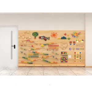 Fábrica de China, venta al por mayor, panel de pared interactivo, juguetes educativos sensoriales montados en la pared DIY para jardín de infantes preescolar