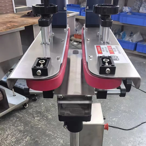 Wanang khoảng cách chuyển bottomless Side <span class=keywords><strong>Gripper</strong></span> lấy dưới mã hóa vành đai băng tải cho không đồng đều dưới chai pet chai Hệ thống băng tải - Product Image 2