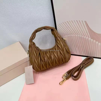 2026 Best-seller nouveau sac demi-lune pour femmes à la mode Design de luxe, sac plissé nuage croissant, sac à bandoulière souple