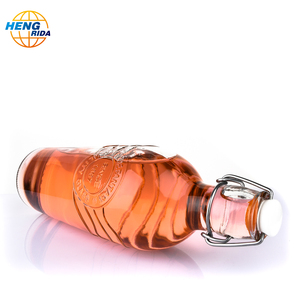Botella <span class=keywords><strong>de</strong></span> vidrio superior con Clip <span class=keywords><strong>de</strong></span> Metal giratorio redondo <span class=keywords><strong>de</strong></span> 1000ml para <span class=keywords><strong>agua</strong></span>, aceite <span class=keywords><strong>de</strong></span> jugo, botella <span class=keywords><strong>de</strong></span> vidrio vacía, dispensador <span class=keywords><strong>de</strong></span> aceite <span class=keywords><strong>de</strong></span> oliva y aceite <span class=keywords><strong>de</strong></span> cocina <span class=keywords><strong>de</strong></span> <span class=keywords><strong>1</strong></span> <span class=keywords><strong>litro</strong></span> - Product Image 3