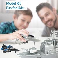 Vente en gros de mini-jouets promotionnels : kits de modèles en plastique de chasseurs et navires de guerre éducatifs à rétrofriction, à bas prix
