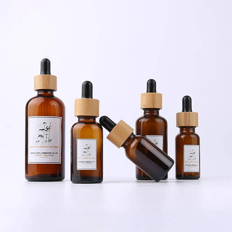 Packaging cosmetico in vetro ambra contagocce bottiglie di bambù ambra trasparente olio di vetro contagocce 10lm 20ml 30ml 50ml 100ml