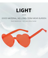 Vente en gros unisexe pêche en forme de coeur antireflet sans monture lunettes à lentille en PC une pièce monture marron amour soleil coloré personnalisé