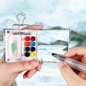 Mini ensemble de peinture <span class=keywords><strong>aquarelle</strong></span> <span class=keywords><strong>portable</strong></span> 11 pièces <span class=keywords><strong>Kit</strong></span> de palette de voyage avec boîte en acrylique transparent 3 carnets de croquis de poche 6 pinceaux d'artiste - Product Image 3
