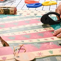 Coupe-papier pour emballage cadeau, outil de découpe pour emballages de Noël et d'anniversaire