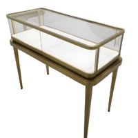 Vitrine de présentation de bijoux de luxe avec cadre en or brossé, verre trempé et éclairage LED pour boutiques, commerces de détail et centres commerciaux