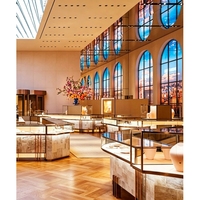 Vitrine haut de gamme en marbre et or rose pour bijouterie, conception complète de magasin sur mesure ODM/OEM, solution de présentation tout-en-un