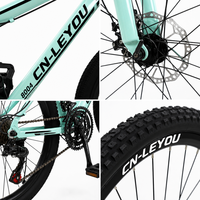 Vélo de montagne en alliage avec fourche à suspension avant, freins à disque, transmission multi-vitesses, pneus à crampons, vélo de montagne à cadre rigide