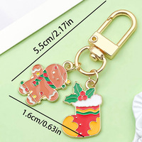 Porte-clés créatif de Noël avec effet d'huile coulante, design de dessin animé mignon, cadeau festif pour enfants et adultes