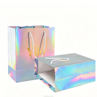 Sacs cadeaux en papier holographique écologiques et recyclables en gros avec poignée en ruban gros-grain pour vêtements et articles de mode