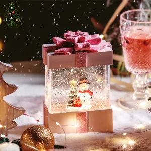 KG Xmas Grosir Kerajinan Resin Noel Navidad High-End Pink Musikal Natal Air Globe Dioperasikan Baterai Salju Globe Natal