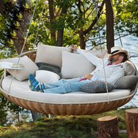 Fauteuil suspendu de style moderne pour l'extérieur, lit de repos confortable avec coussins, idéal pour la villa, le jardin, la cour, la terrasse, le balcon, le bord de la piscine