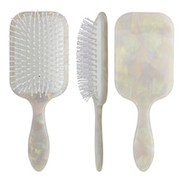 Brosse à cheveux en acétate avec coussin d'air et logo personnalisé, finition brillante, idéale pour les mariages, les voyages et la maison