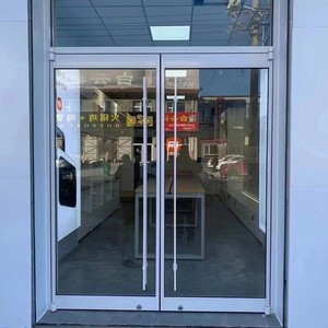 KFC <span class=keywords><strong>Prix</strong></span> d'usine <span class=keywords><strong>Porte</strong></span> de sécurité moderne en alliage d'aluminium Finition en acier inoxydable étanche pour les chaînes de magasins et les centres commerciaux - Product Image 1