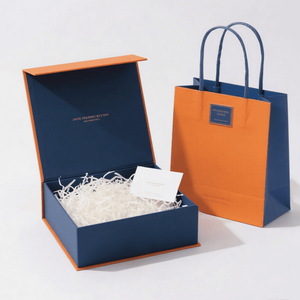 Boîte cadeau magnétique bleue avec bordure <span class=keywords><strong>orange</strong></span> et sac en papier assorti pour les produits cosmétiques de soin de la peau de luxe, emballage de produits de cadeaux haut de gamme - Product Image 1