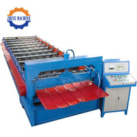 Machine de formage de rouleaux de tôles d'aluminium pour la production de panneaux de toiture