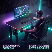 Bureau de jeu AOR E-Sports à hauteur réglable, plateau style fibre de carbone, éclairage d'ambiance RGB, mémoire de trois niveaux, vente en gros usine