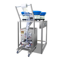 Machine d'emballage multi-têtes entièrement automatique avec alimentateur vibrant en spirale pour le mélange, le portionnement et le comptage de granulés