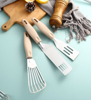Nouvelle arrivée Spatule à fente en acier inoxydable PP de haute qualité
