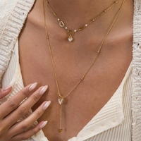 Doppellagige Halskette für Frauen mit Herz-Zirkonia-Anhänger und Perlmutt-Charm, Zarter Schmuck, Kundenspezifischer Großhandel OEM-Lieferant