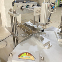 Machine semi-automatique de remplissage et de scellage de coupelles pour biscuits, chocolat et snacks