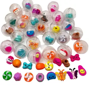 कैप्सूल खिलौने पारदर्शी प्लास्टिक सामग्री के साथ अंदर अलग अलग आंकड़ा खिलौने वेंडिंग मशीन के रूप में बच्चों के लिए उपहार