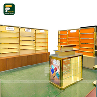 Parfumerie de luxe Design d'intérieur personnalisé or vitrine comptoir de vente au détail parfum magasin luminaire moderne vitrine