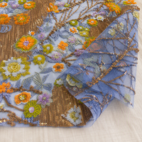 Tissu en tulle jacquard tricoté à sequins floraux multicolores pour robes de soirée et de mariée