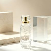 Vente en gros d'usine - Flacons de parfum en verre luxueux et élégants de 50 ml et 100 ml, forme cylindrique, flacon de parfum vide et boîte