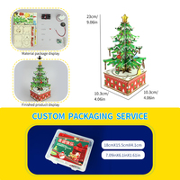 Jouets de construction en blocs sur le thème de l'arbre de Noël rotatif en gros pour enfants