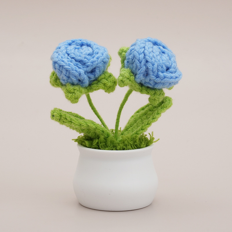 Double-headed rose with blue leaves