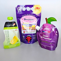 Emballage de boisson liquide transparent imprimé personnalisé sac de pochette à bec en plastique de qualité alimentaire pour l'alcool sont pliables